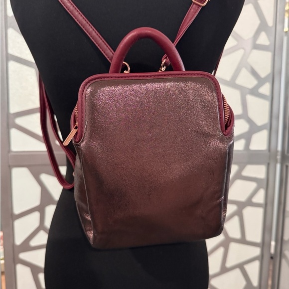 Free People Handbags - Free People Metallic Maroon Backpack